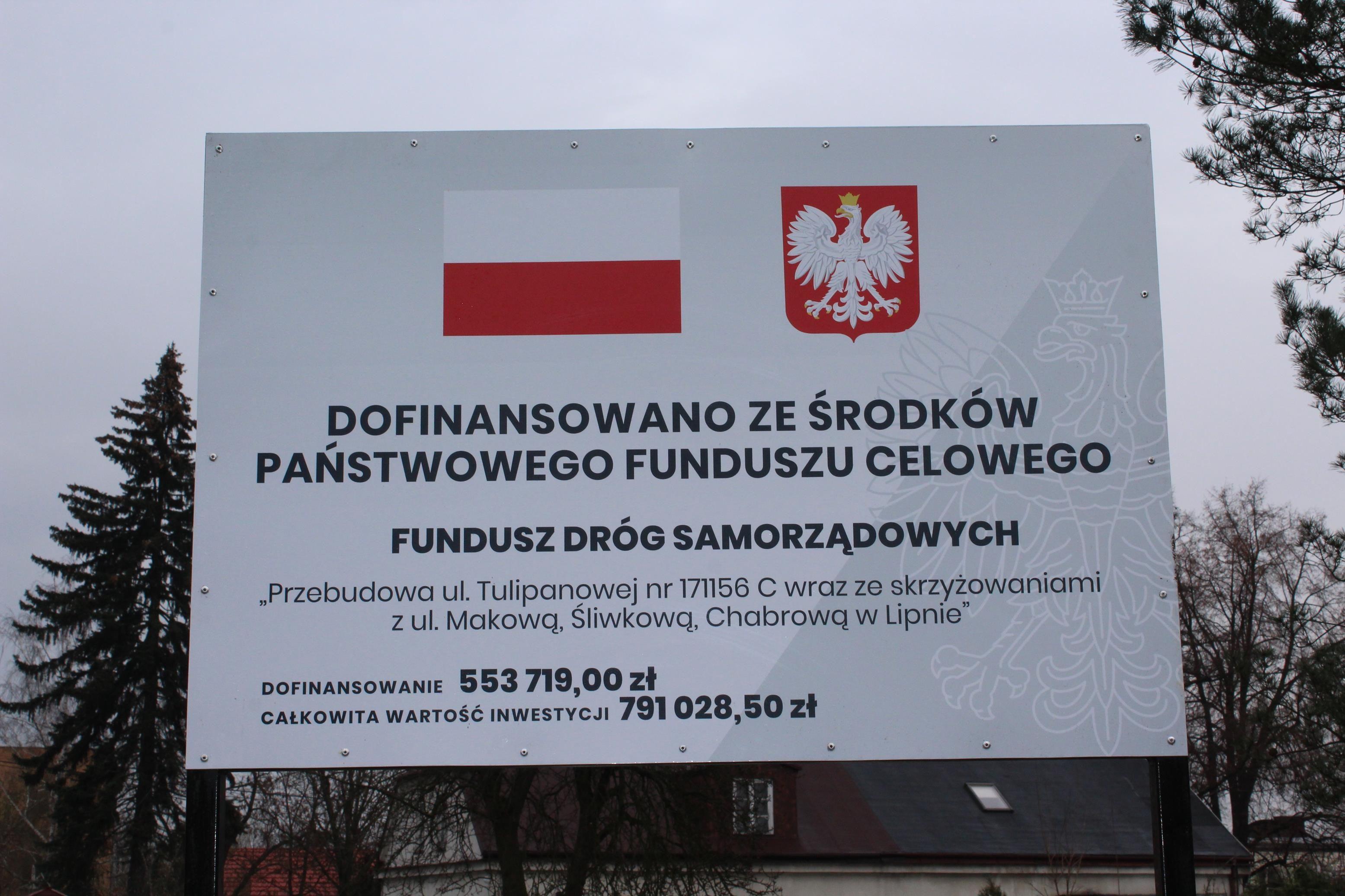 Przebudowa ulicy Tulipanowej - tablica informacyjna Funduszu Dróg Samorządowych - kliknięcie spowoduje powiększenie